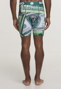 Herreboxershorts med et peng-tema trykk i grønt og hvitt. Designet inkluderer detaljerte gjengivelser av 100-dollar sedler.