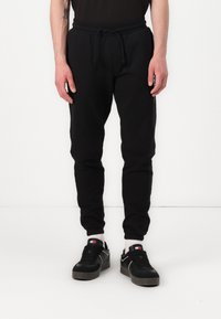Tommy Jeans - SLIM PANT - Pantaloni sportivi - black Immagine in miniatura 1