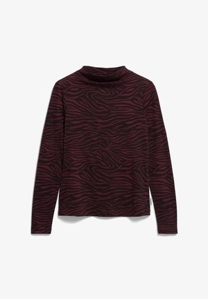 Haut à manches longues bordeaux avec des rayures zèbres noires et un col haut, posé à plat sur un fond blanc.