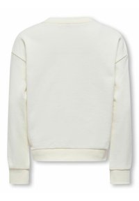 Sweatshirt crème avec un col rond classique, des épaules tombantes, et des poignets et un ourlet côtelés. Tissu doux et texturé avec un minimum de détails.