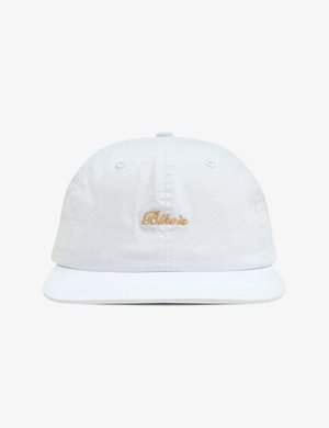 White cap made of cotton with a flat brim. Features embroidered gold logo on the front. Design is simple with no additional patterns or accents.
