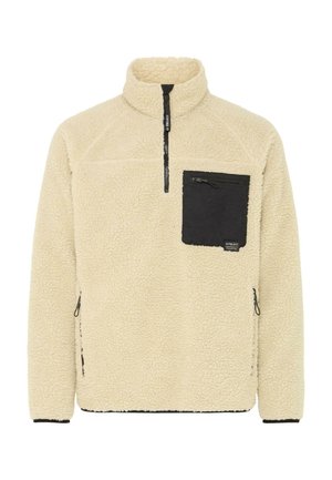 Pull-over en polaire ivoire avec une poche zippée noire. Doté d'un col montant, de manches longues et de poches zippées sur les côtés. Matériau texturé et confortable.