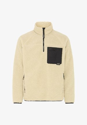 Fleece pullover in off-white met een zwarte ritszak. Beschikt over een hoge kraag, lange mouwen en zijritszakken. Gestructureerd, comfortabel materiaal.