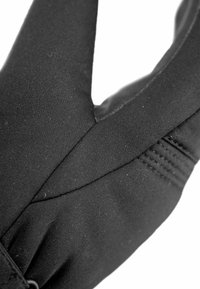 Schwarze Handschuhe mit passgenauem Design aus glattem Stoff, auffälligen Nähten und einer strukturierten Handfläche für einen besseren Griff. Mit elastischen Bündchen akzentuiert.