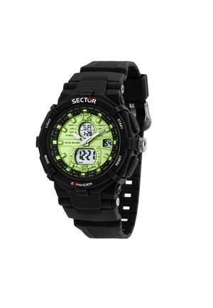 Orologio digitale con cinturino in gomma nera, quadrante verde e diversi display digitali per l'ora, la data e la sveglia. Impermeabile fino a 50 metri.