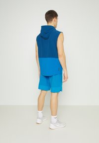 Under Armour VANISH WOVEN - Calções desportivos - cruise blue/fresco blue