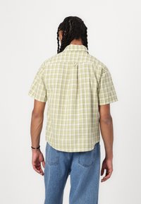 HUF TOTAL ECLIPSE SHIRT UNISEX - Button down-skjorte - mustard
