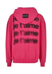 Felpa rosa con tasca a marsupio, polsini e vita a costine. Il retro presenta una scritta nera ripetuta che dice "je t'aime" in uno stile simile alla vernice spray.