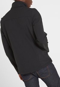 TOG24 FEIZOR - Light jacket - black