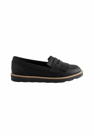 Mocassins en cuir noir avec un bord festonné et des détails à franges à l'avant. Dotés d'une semelle en caoutchouc plate et d'un contour beige contrastant.