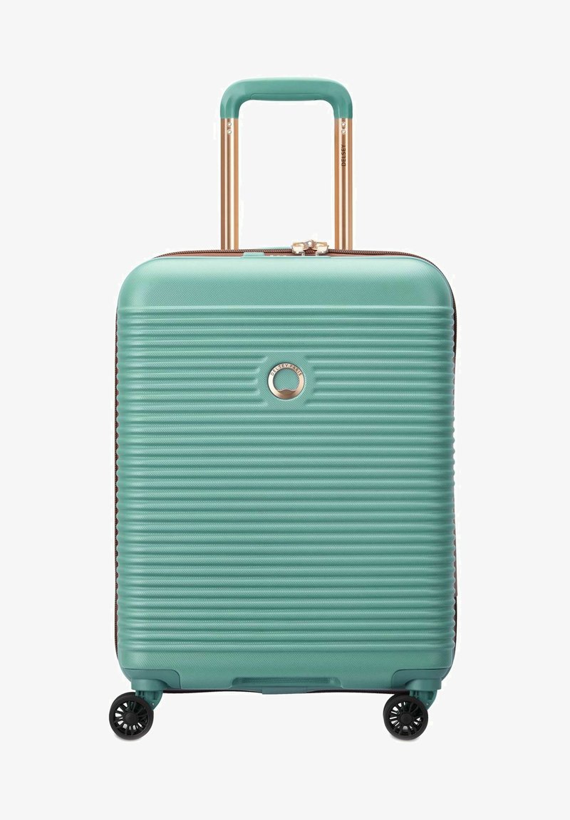 Valigia rigida di colore teal con righe orizzontali, manico telescopico in oro rosa e quattro ruote nere per la mobilità. Chiusura zippata sicura.