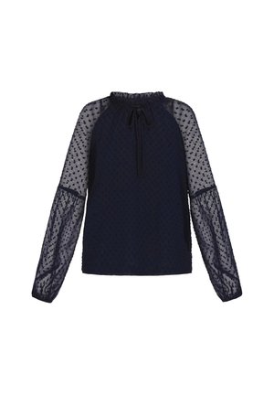 Tumed sinine topp, millel on tekstuuriga laternaga kohtadega disain, läbipaistvad pikad varrukad ja kogutud kaelus, millel on side.