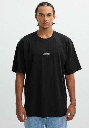 PETIT CAFÉ - Camiseta estampada - black