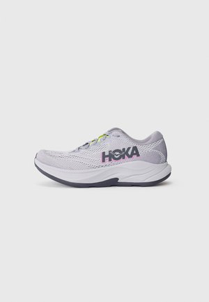 Running shoe with a light gray mesh upper, black and pink branding, yellow laces, and a white sole with a gray accent.