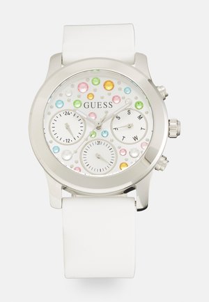 Relógio com pulseira de silicone branca, caixa de aço inoxidável prateada, mostrador branco adornado com gemas coloridas e três submostradores para cronometragem.