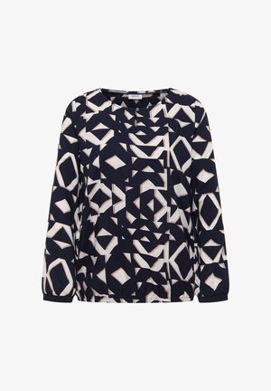 Blouse à manches longues en bleu marine avec un motif géométrique crème et beige. Présente un col rond, une fermeture à boutons et un ourlet élastique. Tissu lisse.