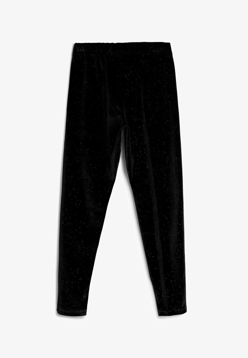 Leggings en velours noir avec des détails scintillants subtils et une taille élastique, présentés à plat sur un fond blanc.