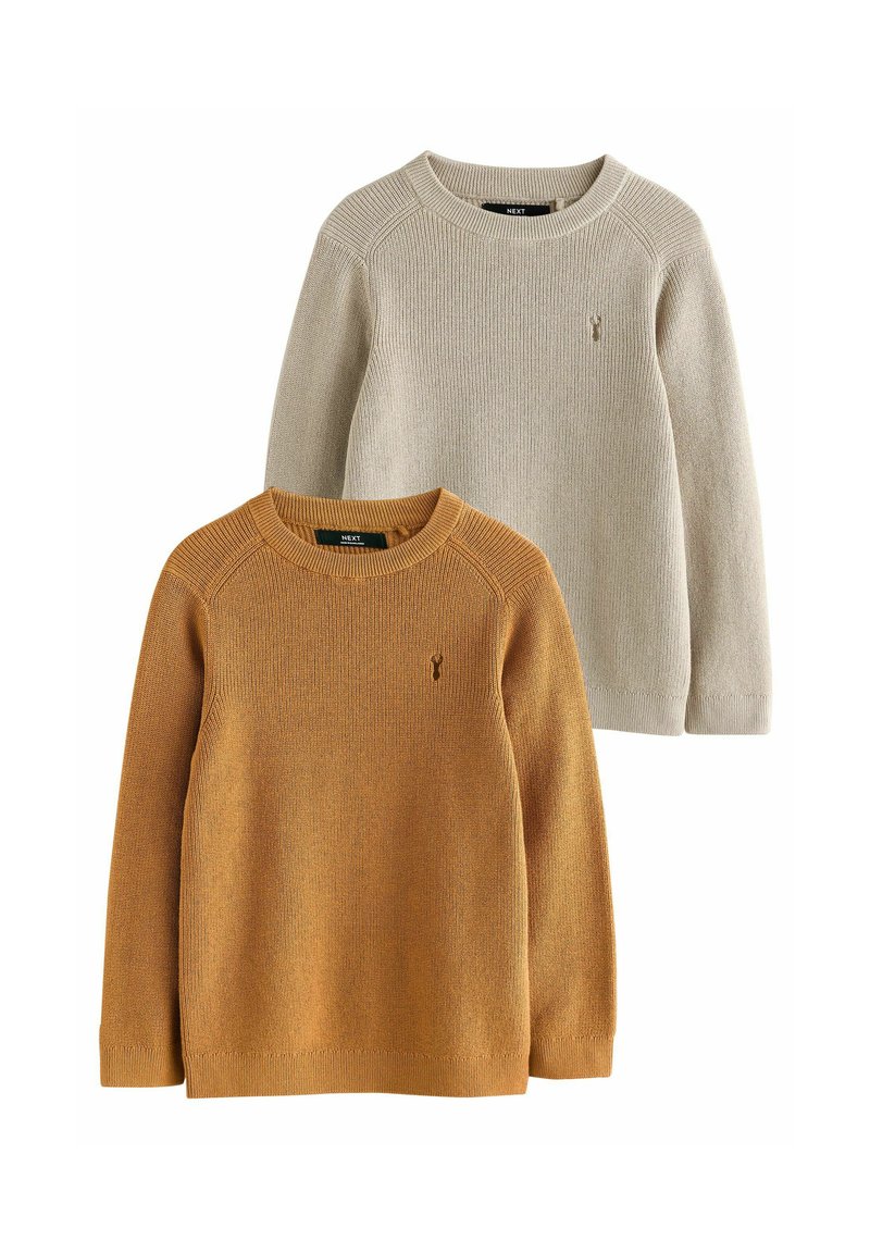 Två tröjor: en i ljusbeige och den andra i varm orange. Båda har ribbad textur, rund hals och en liten logotyp på bröstet.