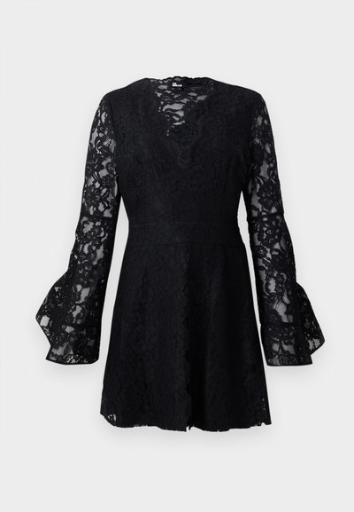 Black lace dress with a fitted waist, long bell sleeves, scalloped neckline, and floral pattern, featuring a flared hemline.