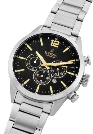 Silver stainless steel wristwatch with a black dial, gold accents, chronograph subdials, and a date display at the 6 o'clock position.