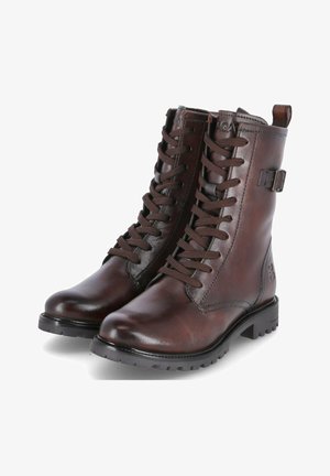 Brown leather ankle boots with lace-up front, sturdy soles, and side buckle detail. Smooth texture and rounded toe design.