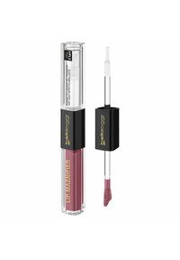 Prodotto labbra liquido in un tubo trasparente con un cappuccio nero. Tonalità di rosa, con un morbido applicatore. Il testo include "LIP MAGNIFIER" in oro.