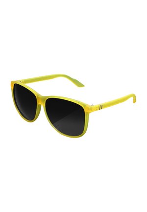 Yellow gradient frame sunglasses with dark black lenses. Wide cat-eye shape, sleek arms with two accent stripes near the hinge.