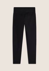 Leggings neri realizzati in tessuto elasticizzato, con una vita alta e una texture liscia, progettati per il comfort e la flessibilità.