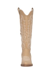Botas de vaquero de cuero marrón con cañas altas, patrones cosidos en blanco, lengüetas de tirón y punteras puntiagudas. Cierre de cremallera en el lateral para una fácil colocación.