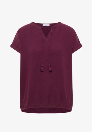 Short-sleeve, textured dark purple blouse with V-neck, decorative tassel ties, and elastic hem.