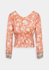 Blusa de manga longa em pêssego com estampa floral. Apresenta uma cintura franzida e punhos texturizados com borda estampada nas mangas.
