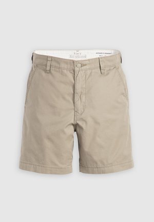 Shorts en chino beige en coton, avec une fermeture à bouton, des poches latérales et une coupe droite. Texture lisse avec une coupe décontractée.