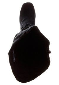 Botte noire en suède haute avec un bout arrondi et une fermeture éclair sur le côté, vue de dessus montrant l'intérieur de la tige ouverte.