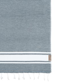 Gray woven textile with white stripes, featuring fringed edges. A small brown label is visible at the lower right corner.