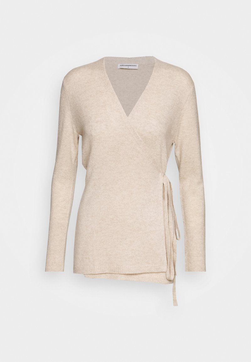 Beige omslagströja med V-ringning, långa ärmar och knytning på sidan. Mjuk textur med ribbade ärmmuddar och en något avslappnad passform.