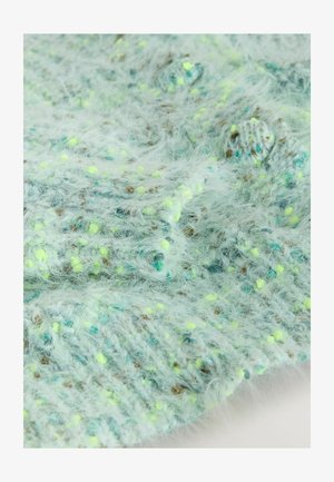 Texturiertes, hellblaues Strickgewebe mit flauschigen Fasern und Sprenkeln von Gelb und Braun; zeigt ein lockeres, luftiges Webmuster.