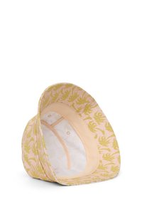 Cappello con motivo floreale in rosa chiaro con foglie di palma verdi. Presenta una fodera interna e una visiera morbida e strutturata.