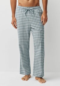 Lätta, blå och vita rutiga pyjamasbyxor med elastisk midja och dragsko, med en rak bendesign och mjuk textur.
