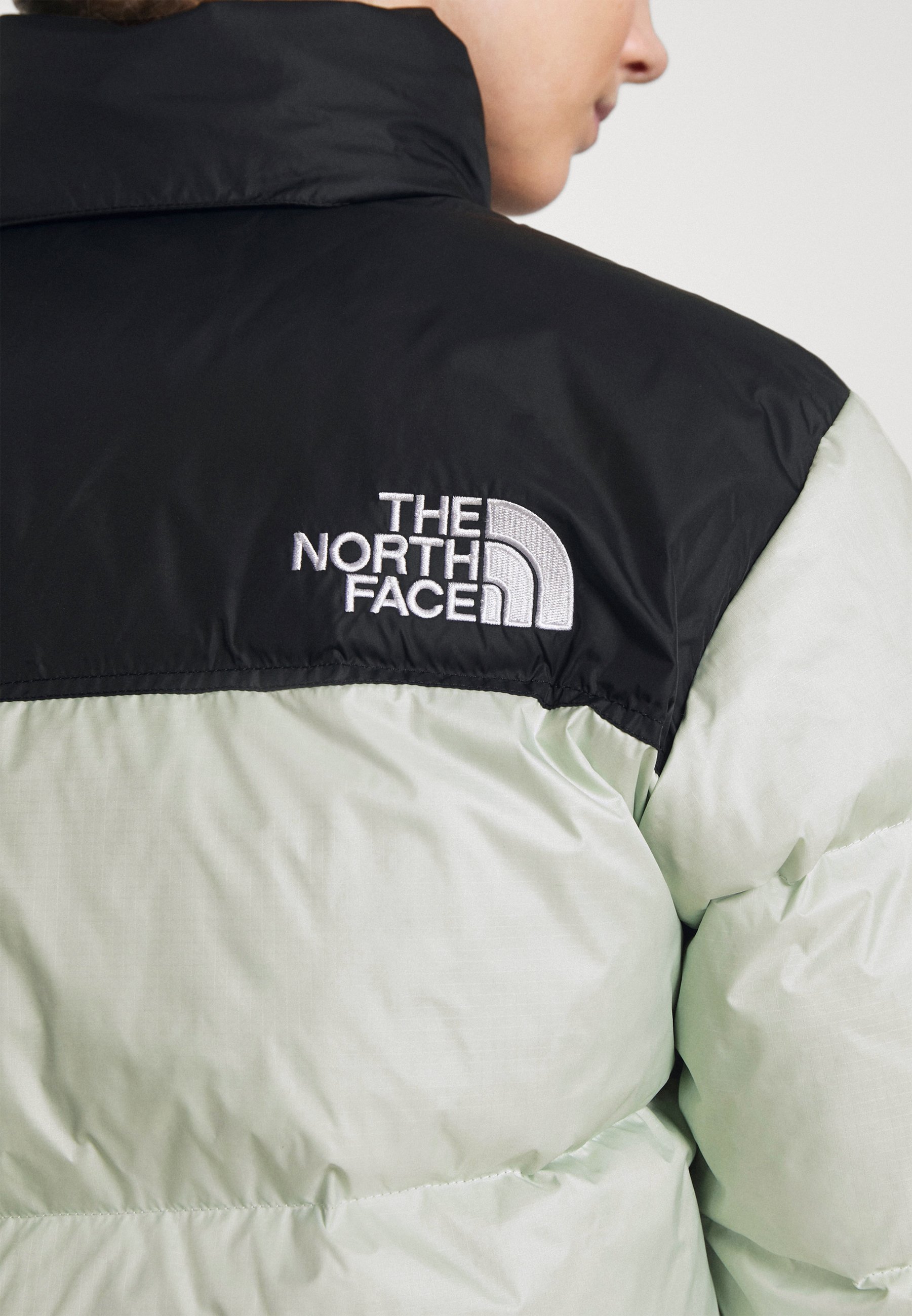 the north face 1996 retro nuptse jacket green mist