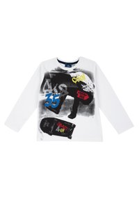 Weißes Langarmshirt mit grafischem Design, das schwarzen, blauen, gelben und roten Text zeigt und Skateboards sowie ein städtisches Thema darstellt.