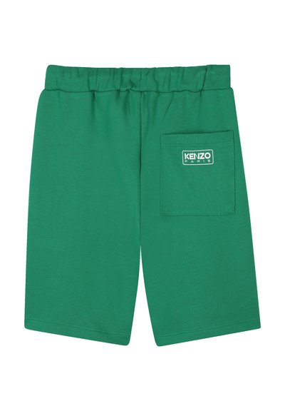 Groene katoenen shorts met elastische tailleband, met een achterzak. Een logo-label is op de zak gestikt. Klassieke snit.