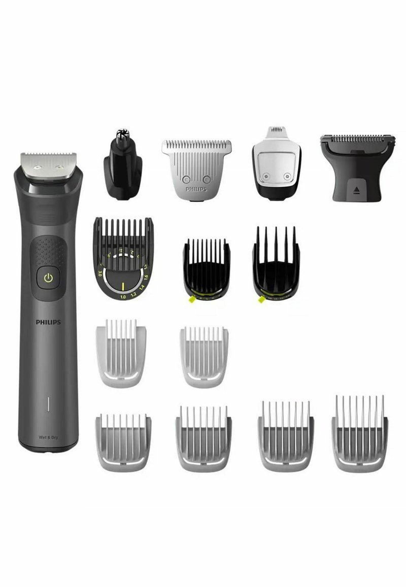 Philips grooming kit featuring a dark gray trimmer with textured grip, multiple silver and black attachment heads, and varying length guards.