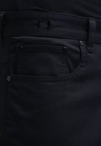 Nike SB Tygbyxor - black