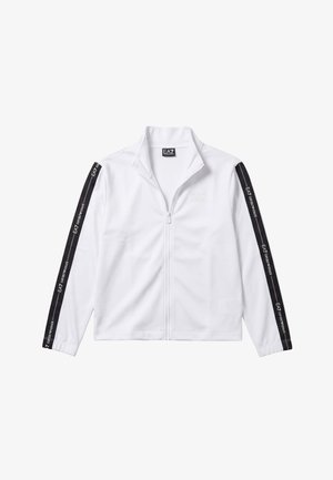 Chaqueta blanca con cremallera, rayas negras y texto "EA7 Emporio Armani" a lo largo de las mangas, cuello alto y un logo sutil en el pecho.