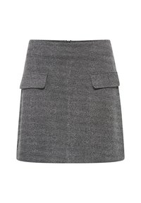 Jupe à motif chevrons en noir et blanc, avec deux poches avant et une fermeture éclair au dos. Coupe droite, tissu texturé.