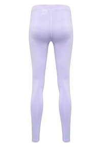 Ljuslila leggings av stretchigt tyg, med en slät yta och minimala sömmar, designade för en tajt passform.