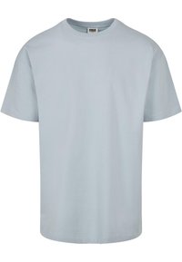 Světle modré bavlněné tričko s krátkým rukávem, designem s kulatým výstřihem a rovnými lemy. Má měkkou strukturu a minimalistický styl.