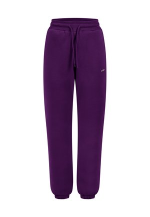 Pantaloni della tuta viola con cintura elastica, cordino regolabile e polsini affusolati. Tessuto morbido con un piccolo logo decorativo sul lato.