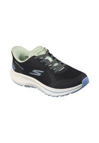 Zapatilla deportiva negra con parte superior de malla, acentos en verde claro, detalles reflectantes y suela blanca acolchada, diseñada para comodidad y soporte.