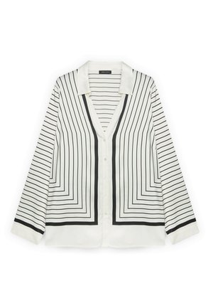 Weiße Bluse mit langen Ärmeln und Knopfleiste, verziert mit schwarzen geometrischen vertikalen und horizontalen Streifenmustern, mit Kragen und V-Ausschnitt.